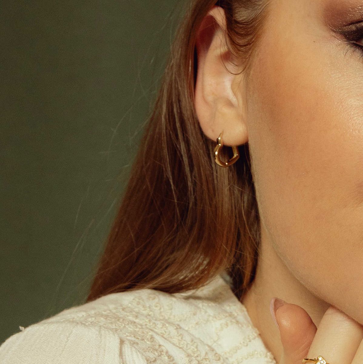 Hjerteglimt øreringer i forgylt sølv