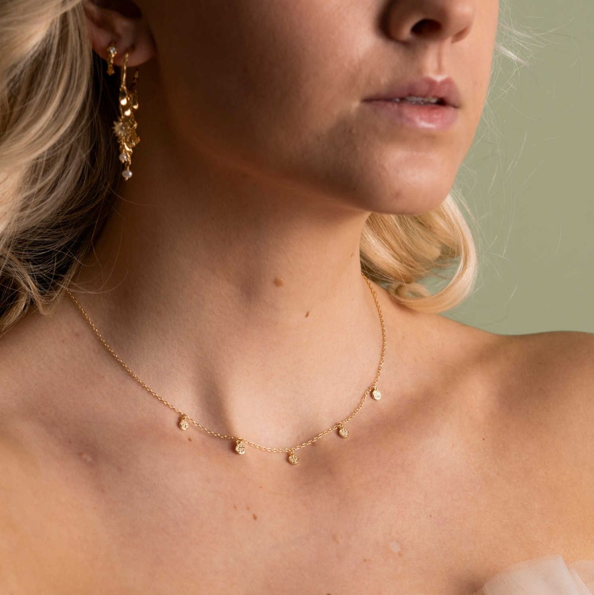 Mellow smykke med charms