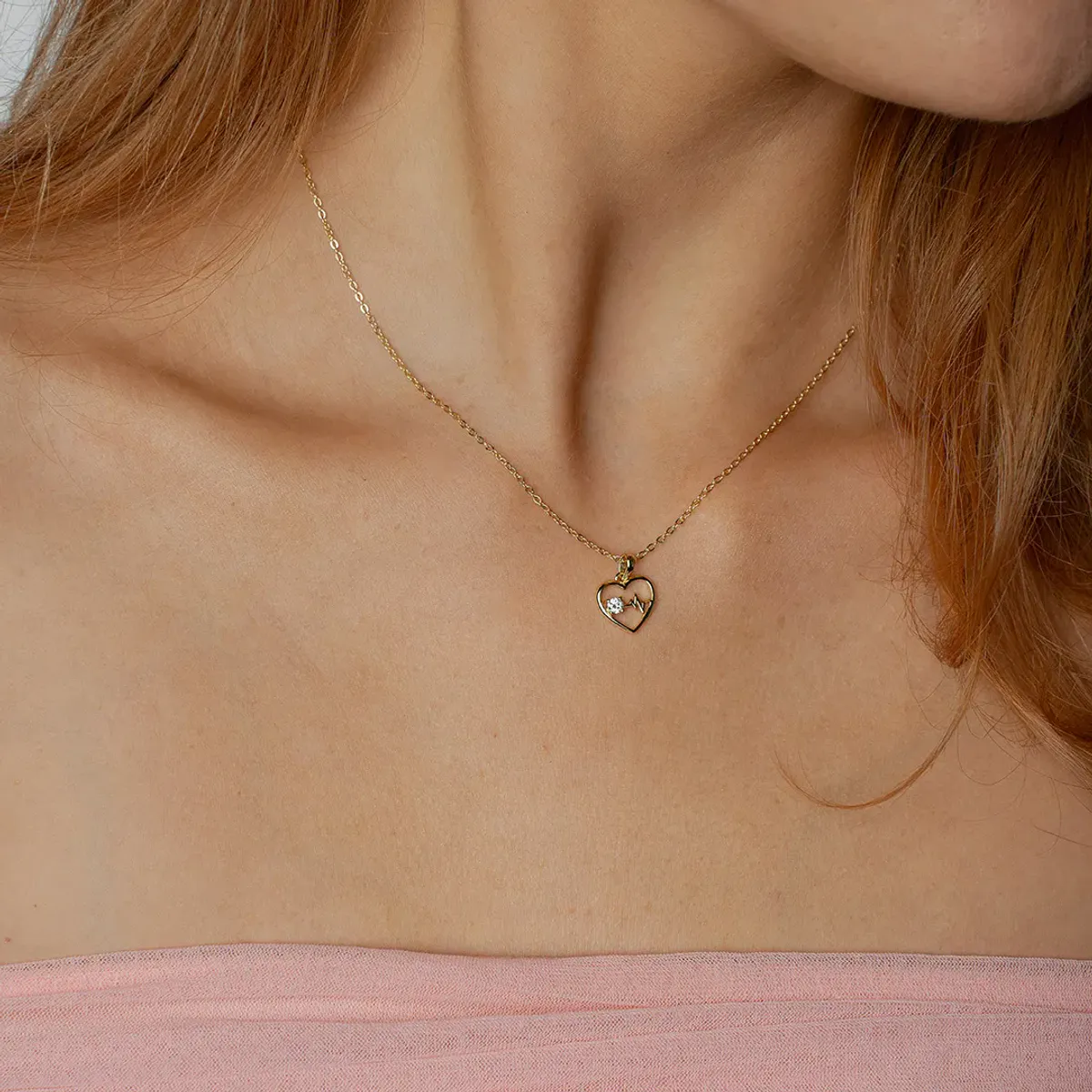 Hjertebank smykke i forgylt sølv riss