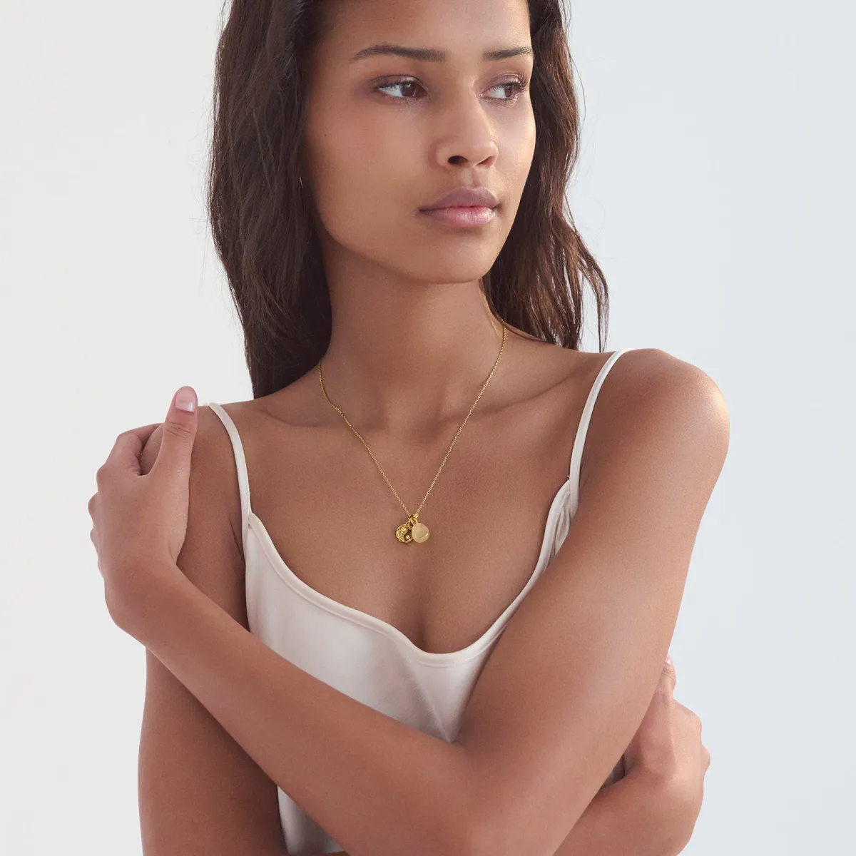 Dualism Pendant, Maanesten